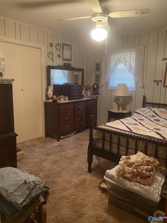 carpeted bedroom with ceiling fan