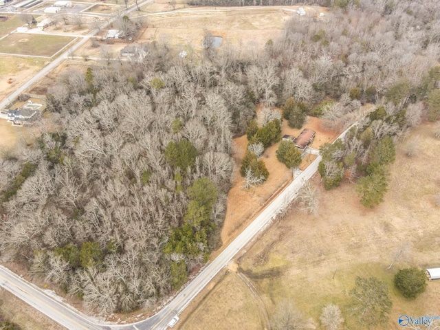 birds eye view of property featuring a rural view