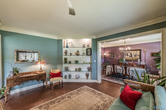 living room featuring ornamental molding and a chandelier