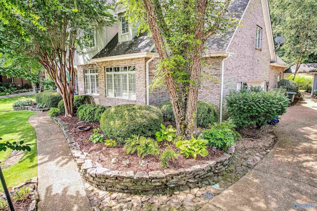 view of property exterior with a garage