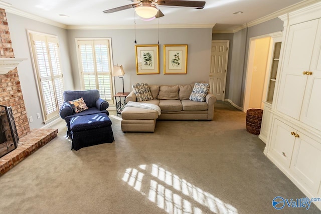 carpeted living room with ceiling fan, ornamental molding, and a brick fireplace