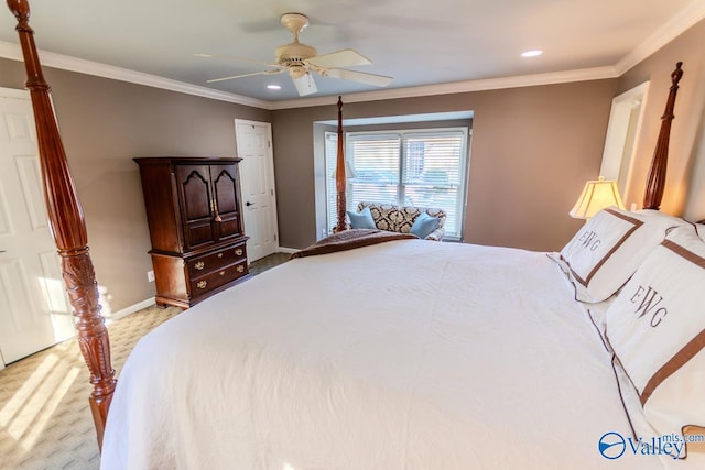 bedroom with ceiling fan, crown molding, and light colored carpet