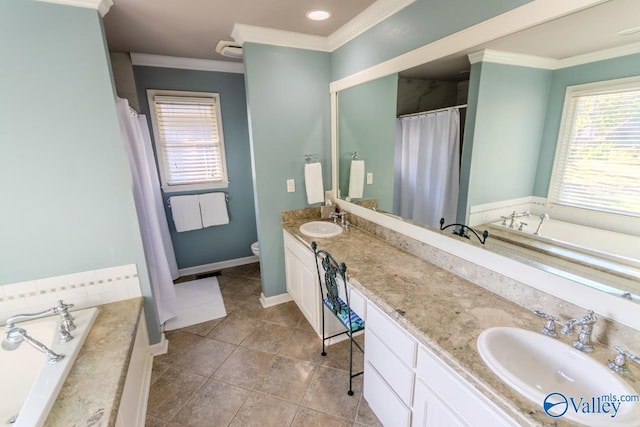 bathroom featuring tiled bath, crown molding, and vanity