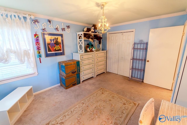 bedroom featuring a chandelier, light colored carpet, a closet, and crown molding