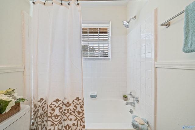 full bathroom with toilet and shower / bathtub combination with curtain