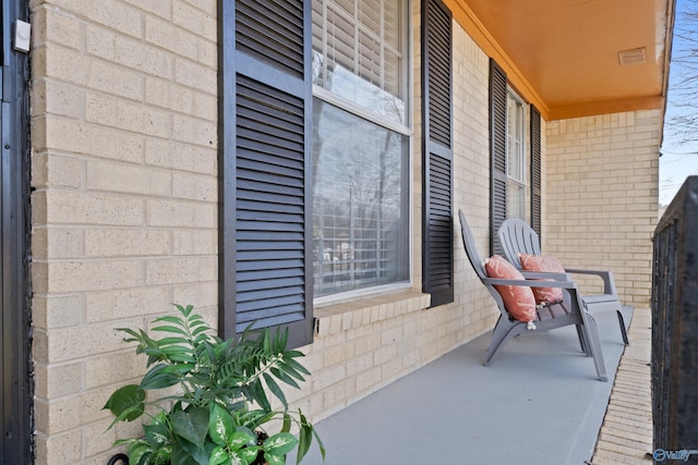 view of patio with visible vents and a porch