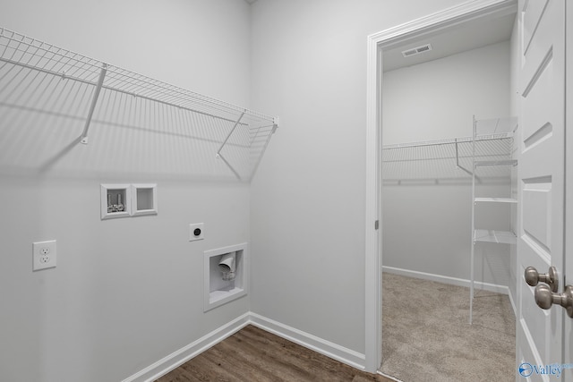 laundry room featuring washer hookup, visible vents, hookup for an electric dryer, laundry area, and baseboards