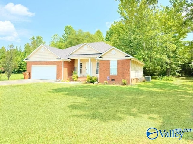 ranch-style house with a garage, a front lawn, and central air condition unit