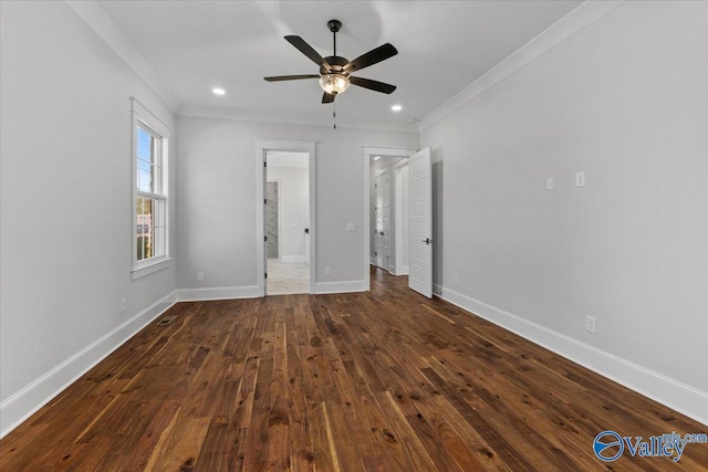 unfurnished bedroom featuring crown molding, recessed lighting, dark wood finished floors, and baseboards