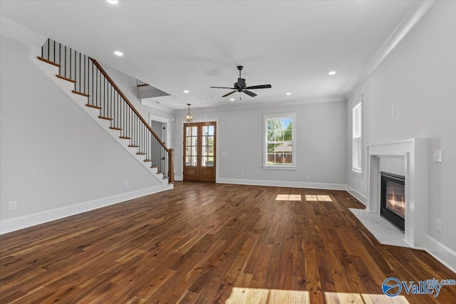 unfurnished living room with recessed lighting, a fireplace, baseboards, stairway, and dark wood finished floors