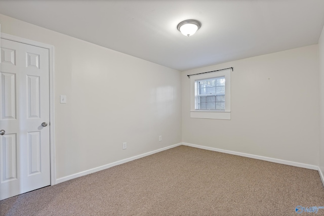 empty room with carpet floors