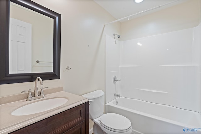 full bathroom featuring vanity, toilet, and washtub / shower combination