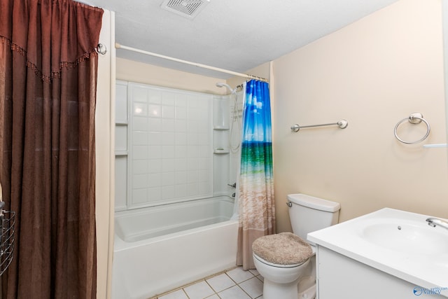 full bathroom featuring tile patterned flooring, toilet, shower / tub combo with curtain, vanity, and a textured ceiling