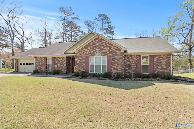 ranch-style home with brick siding, a garage, a front lawn, and concrete driveway