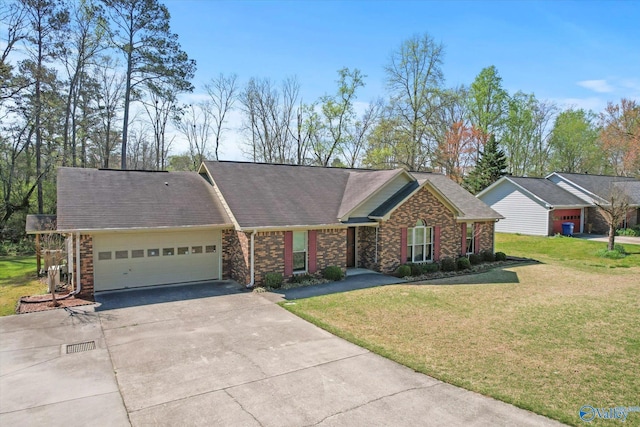single story home with a front yard, driveway, a garage, and a shingled roof