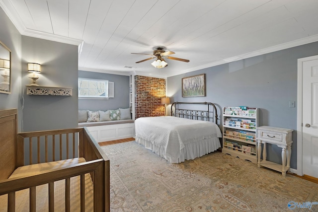 bedroom featuring wood ceiling, ceiling fan, and crown molding