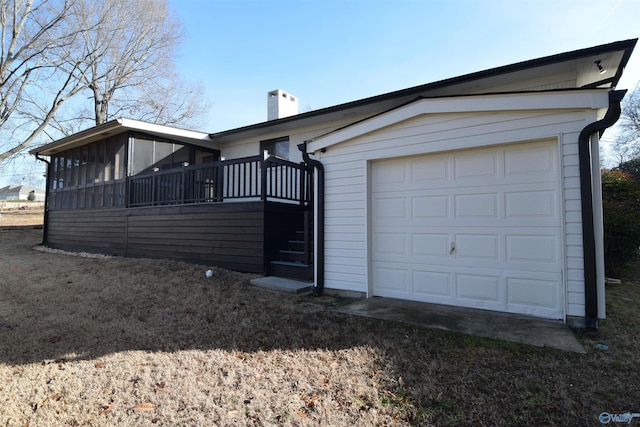 exterior space featuring a sunroom