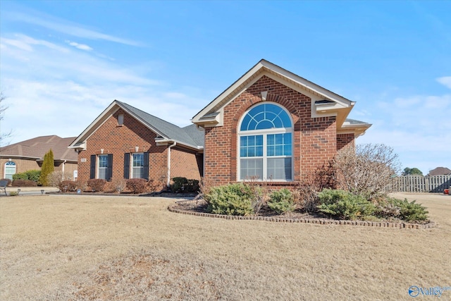 front facade with a front lawn