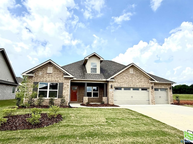 304 Wanto Ln, Huntsville, AL 35811 - view of front facade featuring brick siding, concrete driveway, an attached garage, a front yard, and a shingled roof