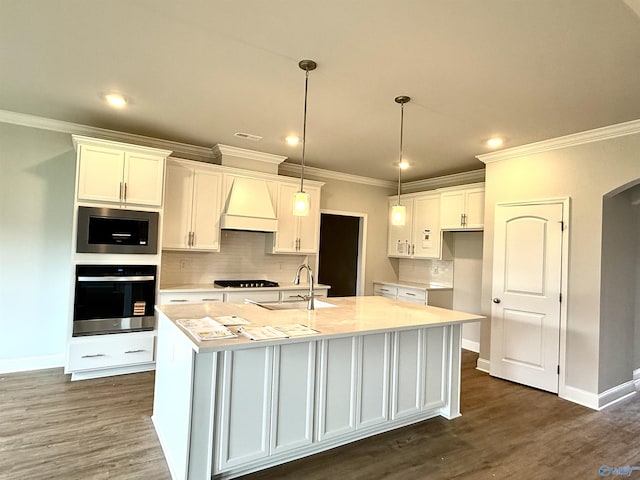 304 Wanto Ln, Huntsville, AL 35811 - kitchen featuring stainless steel oven, white cabinets, black stovetop, tasteful backsplash, and arched walkways