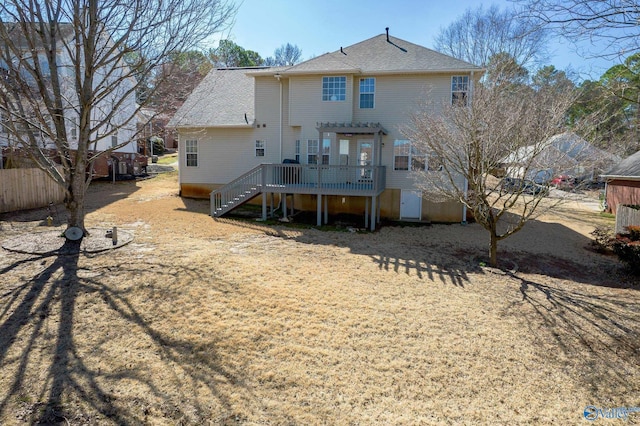 rear view of house with stairs, fence, a pergola, and a wooden deck