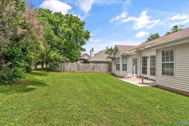 123 Otter Trl, Huntsville, AL 35824 - view of yard featuring a patio area