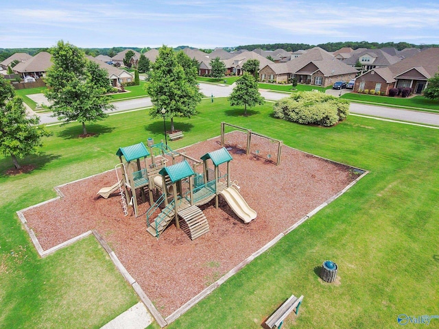 view of play area featuring a lawn