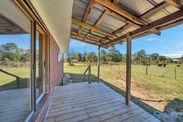 deck featuring a lawn