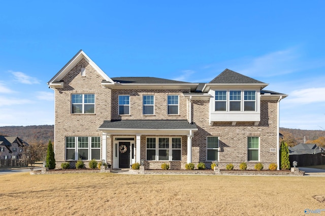 view of front of house with a front lawn