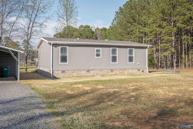 415 County Road 146, Leesburg, AL 35983 - back of property with a yard, crawl space, and driveway