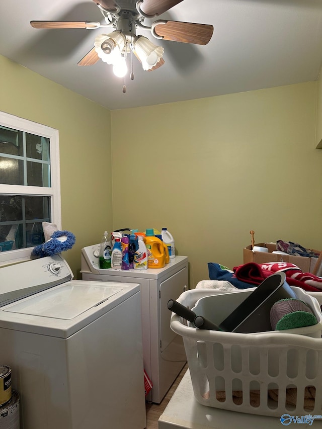 washroom featuring laundry area, separate washer and dryer, and a ceiling fan