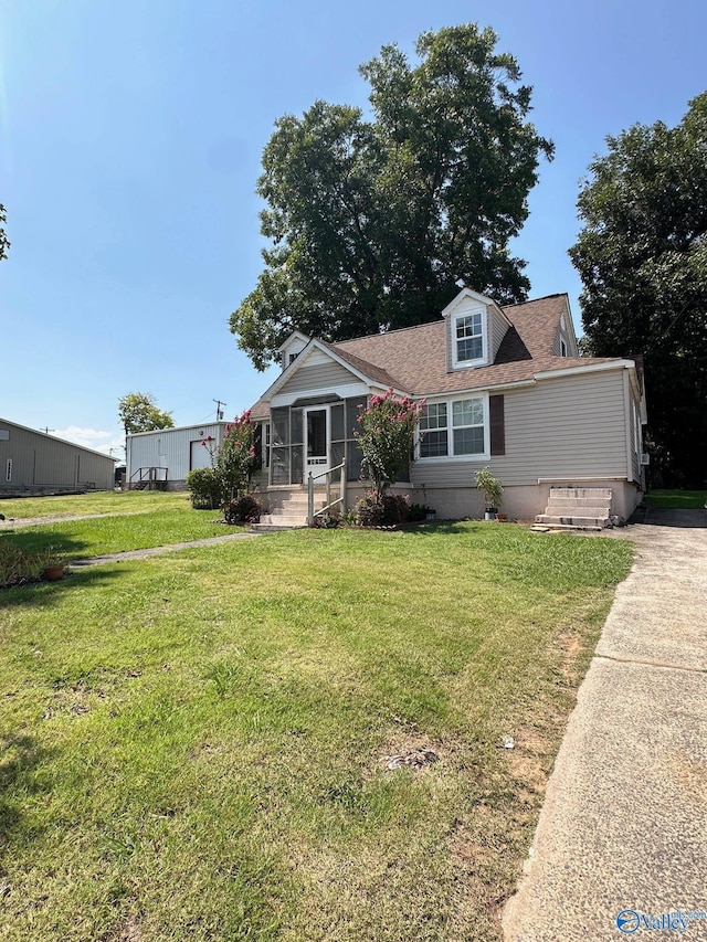 view of front of property with a front lawn