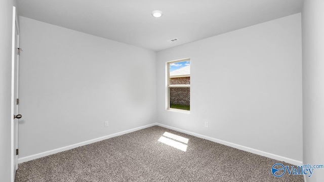 unfurnished room featuring carpet floors