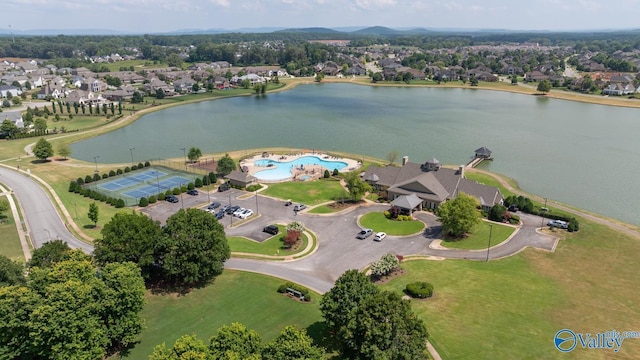 bird's eye view with a residential view and a water view