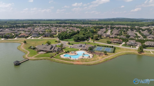 bird's eye view with a residential view and a water view