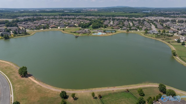 bird's eye view featuring a water view and a residential view