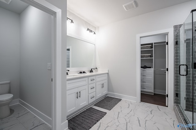 full bathroom featuring a sink, baseboards, toilet, and marble finish floor