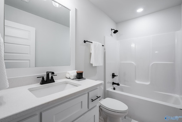 bathroom featuring vanity, recessed lighting, shower / tub combination, and toilet