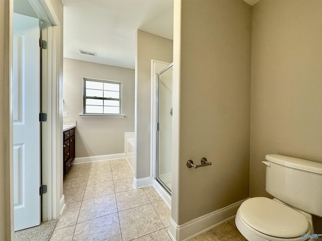 bathroom with baseboards, a shower stall, visible vents, and tile patterned floors