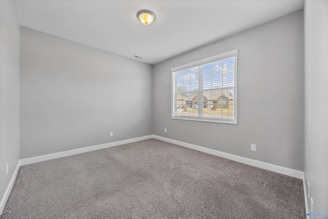 506 Foxridge Dr SW, Hartselle, AL 35640 - unfurnished room featuring carpet flooring and baseboards