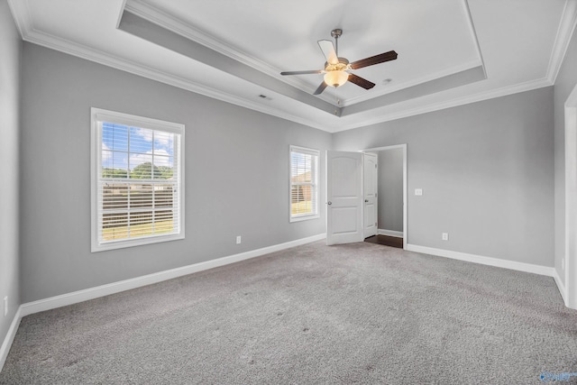 506 Foxridge Dr SW, Hartselle, AL 35640 - unfurnished bedroom featuring crown molding, carpet floors, visible vents, baseboards, and a raised ceiling
