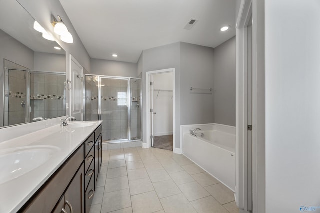 506 Foxridge Dr SW, Hartselle, AL 35640 - full bath with a sink, tile patterned flooring, a stall shower, and visible vents