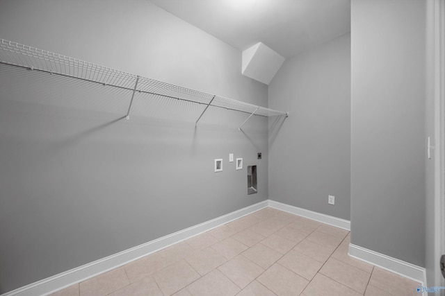 506 Foxridge Dr SW, Hartselle, AL 35640 - laundry room with laundry area, baseboards, hookup for a washing machine, light tile patterned floors, and hookup for an electric dryer