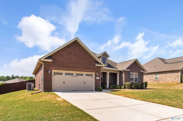 506 Foxridge Dr SW, Hartselle, AL 35640 - view of front of house featuring brick siding, an attached garage, fence, and driveway
