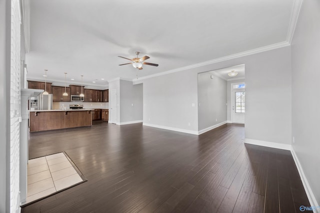 506 Foxridge Dr SW, Hartselle, AL 35640 - unfurnished living room featuring baseboards, ceiling fan, ornamental molding, and dark wood finished floors