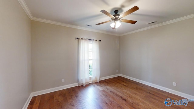 empty room with ornamental molding, ceiling fan, and hardwood / wood-style flooring