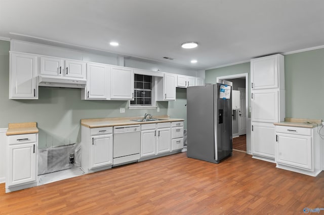 kitchen with light wood-type flooring, white cabinets, stainless steel fridge, and dishwasher