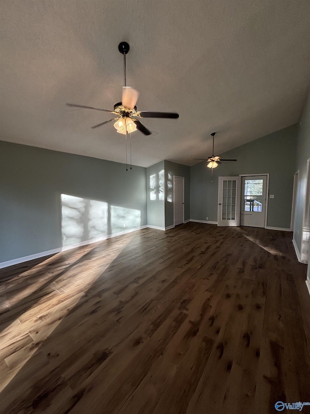 175 County Road 371, Centre, AL 35960 - unfurnished living room featuring ceiling fan, dark wood-style floors, baseboards, a textured ceiling, and lofted ceiling