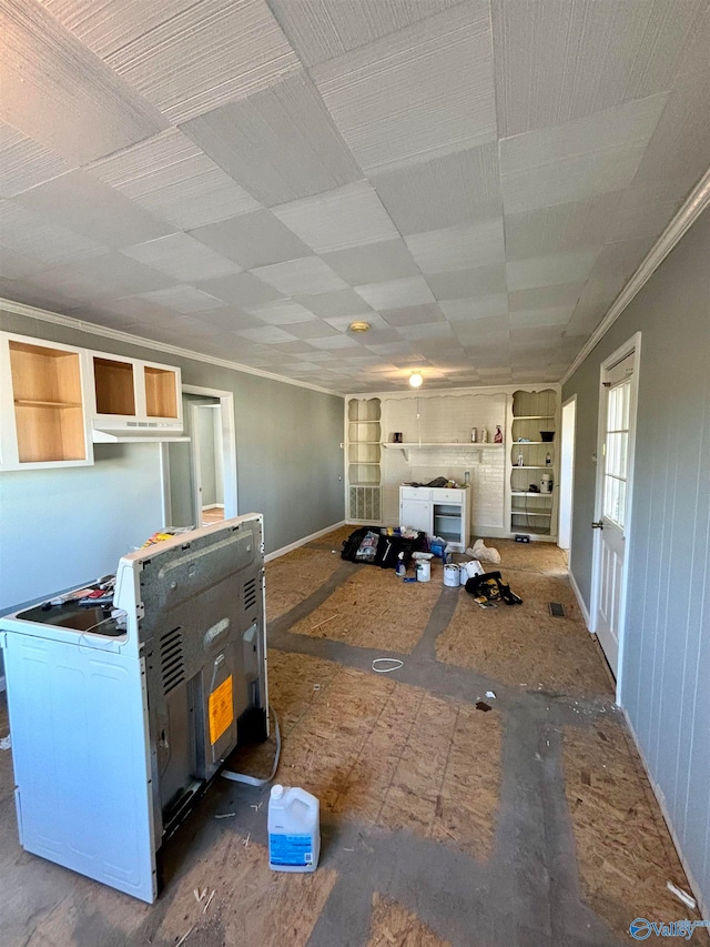 interior space with built in features and crown molding