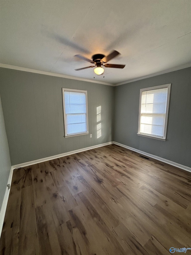 175 County Road 371, Centre, AL 35960 - spare room with crown molding, healthy amount of natural light, a ceiling fan, dark wood-style floors, and baseboards